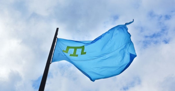 Агрессор приравнял крымскотатарскийфлаг к «экстремистским символам»